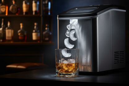 Countertop ice maker dispensing ice into a whiskey glass, moody bar setting